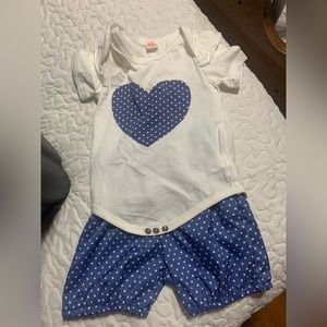 Matching bodysuit and shorts.